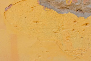 Doku, duvar, beton, arka plan olarak kullanılabilir. Çizik ve çatlaklarla dolu bir duvar parçası.