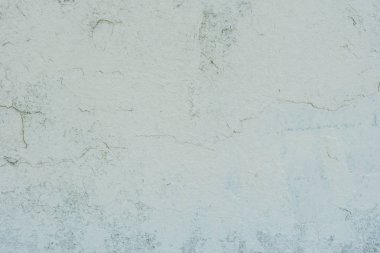 Doku, duvar, beton, arka plan olarak kullanılabilir. Çizik ve çatlaklarla dolu bir duvar parçası.