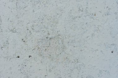 Doku, duvar, beton, arka plan olarak kullanılabilir. Çizik ve çatlaklarla dolu bir duvar parçası.