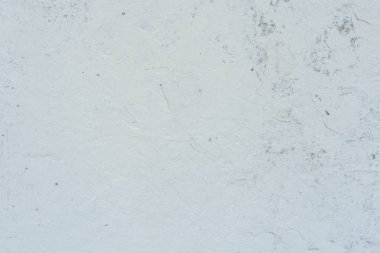 Doku, duvar, beton, arka plan olarak kullanılabilir. Çizik ve çatlaklarla dolu bir duvar parçası.