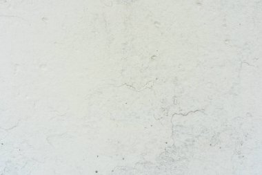 Doku, duvar, beton, arka plan olarak kullanılabilir. Çizik ve çatlaklarla dolu bir duvar parçası.