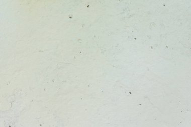 Doku, duvar, beton, arka plan olarak kullanılabilir. Çizik ve çatlaklarla dolu bir duvar parçası.