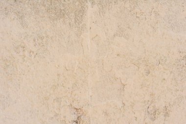 Doku, duvar, beton, arka plan olarak kullanılabilir. Çizik ve çatlaklarla dolu bir duvar parçası.