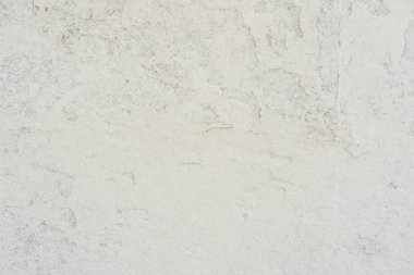 Doku, duvar, beton, arka plan olarak kullanılabilir. Çizik ve çatlaklarla dolu bir duvar parçası.