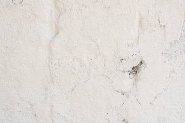 Doku, duvar, beton, arka plan olarak kullanılabilir. Çizik ve çatlaklarla dolu bir duvar parçası.