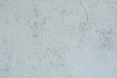 Doku, duvar, beton, arka plan olarak kullanılabilir. Çizik ve çatlaklarla dolu bir duvar parçası.