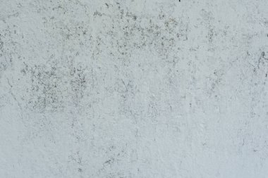 Doku, duvar, beton, arka plan olarak kullanılabilir. Çizik ve çatlaklarla dolu bir duvar parçası.