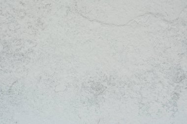 Doku, duvar, beton, arka plan olarak kullanılabilir. Çizik ve çatlaklarla dolu bir duvar parçası.