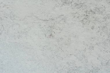 Doku, duvar, beton, arka plan olarak kullanılabilir. Çizik ve çatlaklarla dolu bir duvar parçası.