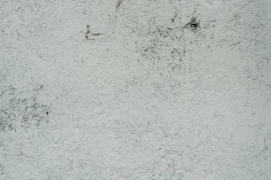 Doku, duvar, beton, arka plan olarak kullanılabilir. Çizik ve çatlaklarla dolu bir duvar parçası.