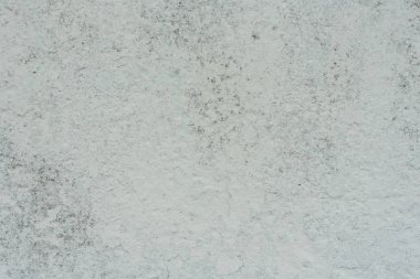 Doku, duvar, beton, arka plan olarak kullanılabilir. Çizik ve çatlaklarla dolu bir duvar parçası.