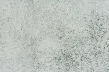 Doku, duvar, beton, arka plan olarak kullanılabilir. Çizik ve çatlaklarla dolu bir duvar parçası.