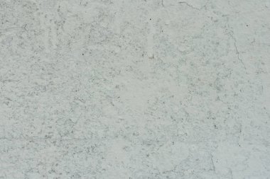 Doku, duvar, beton, arka plan olarak kullanılabilir. Çizik ve çatlaklarla dolu bir duvar parçası.