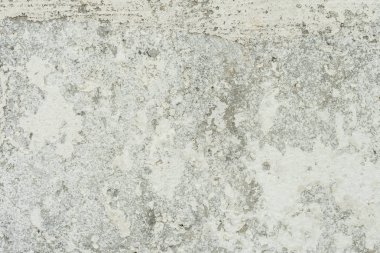 Doku, duvar, beton, arka plan olarak kullanılabilir. Çizik ve çatlaklarla dolu bir duvar parçası.