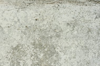 Doku, duvar, beton, arka plan olarak kullanılabilir. Çizik ve çatlaklarla dolu bir duvar parçası.