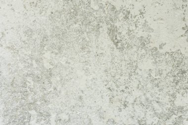 Doku, duvar, beton, arka plan olarak kullanılabilir. Çizik ve çatlaklarla dolu bir duvar parçası.