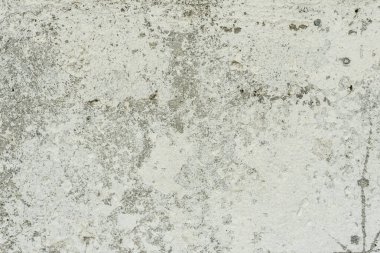 Doku, duvar, beton, arka plan olarak kullanılabilir. Çizik ve çatlaklarla dolu bir duvar parçası.