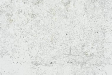 Doku, duvar, beton, arka plan olarak kullanılabilir. Çizik ve çatlaklarla dolu bir duvar parçası.