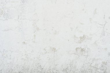 Doku, duvar, beton, arka plan olarak kullanılabilir. Çizik ve çatlaklarla dolu bir duvar parçası.