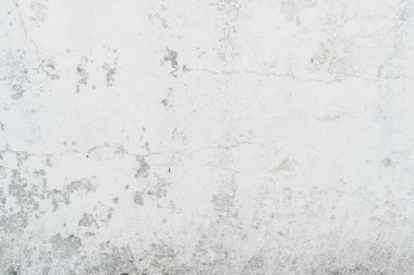 Doku, duvar, beton, arka plan olarak kullanılabilir. Çizik ve çatlaklarla dolu bir duvar parçası.