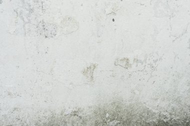 Doku, duvar, beton, arka plan olarak kullanılabilir. Çizik ve çatlaklarla dolu bir duvar parçası.