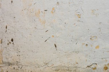 Doku, duvar, beton, arka plan olarak kullanılabilir. Çizik ve çatlaklarla dolu bir duvar parçası.