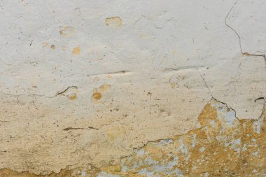Doku, duvar, beton, arka plan olarak kullanılabilir. Çizik ve çatlaklarla dolu bir duvar parçası.
