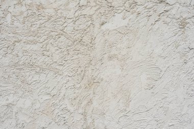 Doku, duvar, beton, arka plan olarak kullanılabilir. Çizik ve çatlaklarla dolu bir duvar parçası.