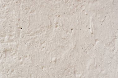 Doku, duvar, beton, arka plan olarak kullanılabilir. Çizik ve çatlaklarla dolu bir duvar parçası.