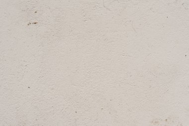 Doku, duvar, beton, arka plan olarak kullanılabilir. Çizik ve çatlaklarla dolu bir duvar parçası.