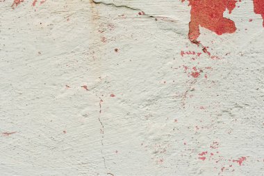 Çatlakları ve çizikleri olan beton bir duvarın dokusu arka plan olarak kullanılabilir.