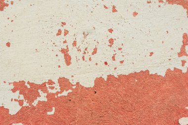 Çatlakları ve çizikleri olan beton bir duvarın dokusu arka plan olarak kullanılabilir.