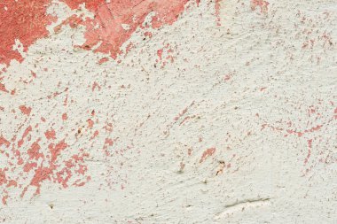 Çatlakları ve çizikleri olan beton bir duvarın dokusu arka plan olarak kullanılabilir.