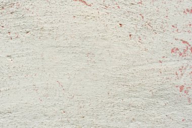 Çatlakları ve çizikleri olan beton bir duvarın dokusu arka plan olarak kullanılabilir.