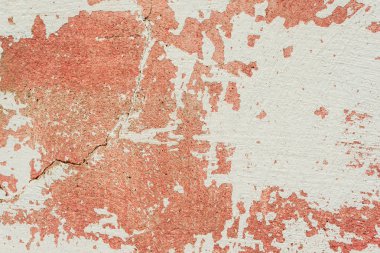 Çatlakları ve çizikleri olan beton bir duvarın dokusu arka plan olarak kullanılabilir.