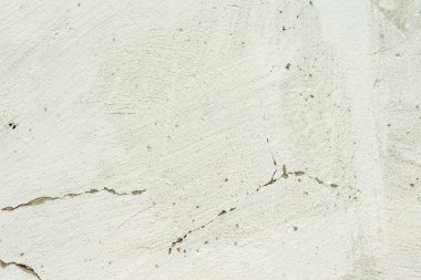Doku, duvar, beton, arka plan olarak kullanılabilir. Çizik ve çatlaklarla dolu bir duvar parçası.