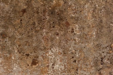 Çatlakları ve çizikleri olan beton bir duvarın dokusu arka plan olarak kullanılabilir.