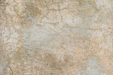 Doku, duvar, beton, arka plan olarak kullanılabilir. Çizik ve çatlaklarla dolu bir duvar parçası.