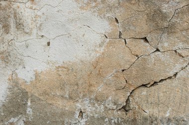 Doku, duvar, beton, arka plan olarak kullanılabilir. Çizik ve çatlaklarla dolu bir duvar parçası.