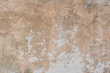 Doku, duvar, beton, arka plan olarak kullanılabilir. Çizik ve çatlaklarla dolu bir duvar parçası.