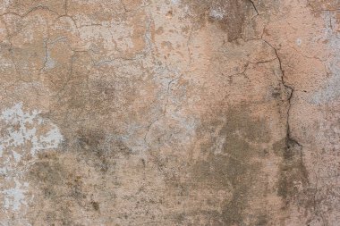 Doku, duvar, beton, arka plan olarak kullanılabilir. Çizik ve çatlaklarla dolu bir duvar parçası.