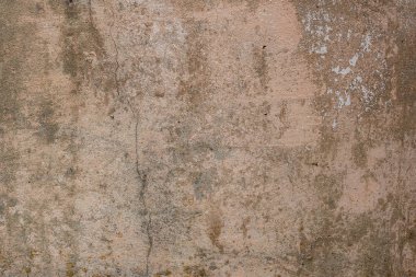 Doku, duvar, beton, arka plan olarak kullanılabilir. Çizik ve çatlaklarla dolu bir duvar parçası.