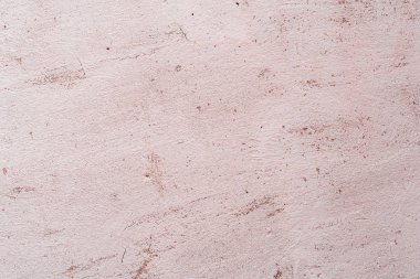 Doku, duvar, beton, arka plan olarak kullanılabilir. Çizik ve çatlaklarla dolu bir duvar parçası.