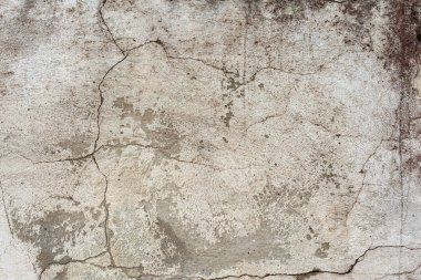 Doku, duvar, beton, arka plan olarak kullanılabilir. Çizik ve çatlaklarla dolu bir duvar parçası.