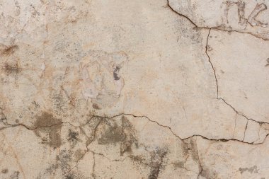 Doku, duvar, beton, arka plan olarak kullanılabilir. Çizik ve çatlaklarla dolu bir duvar parçası.