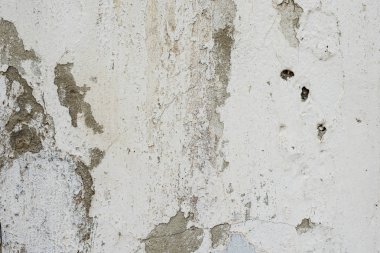 Doku, duvar, beton, arka plan olarak kullanılabilir. Çizik ve çatlaklarla dolu bir duvar parçası.