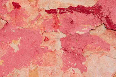 Çatlakları ve çizikleri olan beton bir duvarın dokusu arka plan olarak kullanılabilir.