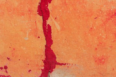 Çatlakları ve çizikleri olan beton bir duvarın dokusu arka plan olarak kullanılabilir.