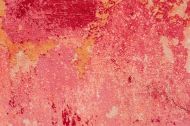 Çatlakları ve çizikleri olan beton bir duvarın dokusu arka plan olarak kullanılabilir.