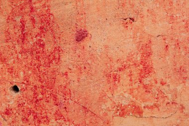 Çatlakları ve çizikleri olan beton bir duvarın dokusu arka plan olarak kullanılabilir.